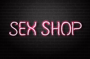Vector realistic isolated neon sign of pink Sex Shop text for decoration and covering on the wall background.